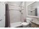 Bathroom showing a walk-in shower with a handheld shower head and a granite-topped vanity and toilet at 3550 Bay Sands Dr # 2101, Laughlin, NV 89029