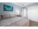 Relaxing bedroom with an aurora borealis artwork, side table, and double door closet at 3550 Bay Sands Dr # 2101, Laughlin, NV 89029