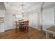 Charming dining area featuring a wooden table, seating for four, and modern light fixture at 3550 Bay Sands Dr # 2101, Laughlin, NV 89029