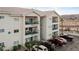 Condominium building featuring balconies, desert landscaping and ample parking at 3550 Bay Sands Dr # 2101, Laughlin, NV 89029