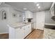 Bright kitchen featuring granite countertops, white cabinetry, and modern stainless steel appliances at 3550 Bay Sands Dr # 2101, Laughlin, NV 89029