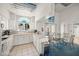 Bright community kitchen with white cabinetry, modern appliances, and an inviting dining area at 3550 Bay Sands Dr # 2101, Laughlin, NV 89029