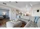 Cozy living room flowing into the kitchen with a comfortable gray sofa and stylish decor at 3550 Bay Sands Dr # 2101, Laughlin, NV 89029