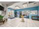 Welcoming lobby with tiled flooring, blue walls, and views of a pool and clubhouse at 3550 Bay Sands Dr # 2101, Laughlin, NV 89029