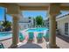 Relaxing community pool with lounge chairs and shaded seating area at 3550 Bay Sands Dr # 2101, Laughlin, NV 89029
