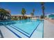 Beautiful community pool with inviting steps, surrounded by lush landscaping and comfortable lounge chairs at 3550 Bay Sands Dr # 2101, Laughlin, NV 89029