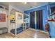 Charming bedroom with custom-built bunk beds and blue accent wall for creative play and restful nights at 3592 Gloucester Gate St, Las Vegas, NV 89122