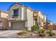 Charming two-story home with an attached garage, desert landscaping, and a well-manicured front yard at 3592 Gloucester Gate St, Las Vegas, NV 89122