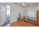 Hallway with wood flooring and view into adjacent room at 3592 Gloucester Gate St, Las Vegas, NV 89122