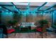 Backyard patio area with comfortable seating and ambient lighting at 3789 Heritage Ave, Las Vegas, NV 89121