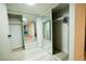 Spacious closet featuring sliding mirror doors with abundant storage space and wood-look tile flooring at 3789 Heritage Ave, Las Vegas, NV 89121