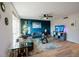 Spacious living room featuring large windows, plush seating, and modern decor for comfortable living at 3789 Heritage Ave, Las Vegas, NV 89121