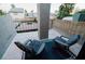 Private patio with cozy seating, offering a peaceful retreat with views of the surrounding neighborhood at 3789 Heritage Ave, Las Vegas, NV 89121
