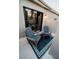 Private patio with cozy seating area, perfect for relaxing outdoors in a quiet setting at 3789 Heritage Ave, Las Vegas, NV 89121