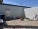 Outdoor patio with flowers and other gardening supplies at 4016 Edgeford Pl, Las Vegas, NV 89102