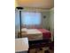 Bedroom with large window and accent curtains at 4016 Edgeford Pl, Las Vegas, NV 89102