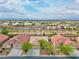 Aerial view of a charming home with well-manicured landscaping in a residential neighborhood at 4029 Ricebird Way, North Las Vegas, NV 89084