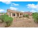Cozy single-story home with a tile roof and low-maintenance desert landscaping at 4029 Ricebird Way, North Las Vegas, NV 89084