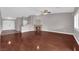 Inviting living room features neutral paint, recessed lighting and hardwood floors at 4029 Ricebird Way, North Las Vegas, NV 89084