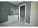 Bathroom featuring a modern vessel sink vanity, updated fixtures and tile flooring at 4732 Illustrious St, Las Vegas, NV 89147