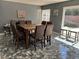Dining room featuring large window, marble floors, and modern furniture and decor at 4732 Illustrious St, Las Vegas, NV 89147