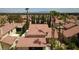 Charming two-story home featuring a red tile roof and well-maintained landscaping at 4732 Illustrious St, Las Vegas, NV 89147