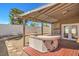 Backyard featuring a covered patio with a built in outdoor bar and tile flooring at 4889 W Montara Cir, Las Vegas, NV 89121