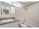 Well-lit bathroom featuring a single sink vanity, tub, and shower combination at 4889 W Montara Cir, Las Vegas, NV 89121