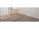 Bright bedroom featuring neutral walls, plush patterned carpeting, and walk-in closet at 4889 W Montara Cir, Las Vegas, NV 89121