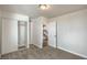 Bedroom featuring neutral walls, carpet floors, closet, and doorway leading to other parts of the home at 4889 W Montara Cir, Las Vegas, NV 89121