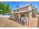 The backyard boasts a built-in outdoor kitchen, perfect for summer barbecues and gatherings at 4889 W Montara Cir, Las Vegas, NV 89121