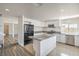 Kitchen features an island, stainless appliances, and granite counters at 4889 W Montara Cir, Las Vegas, NV 89121