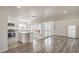 Open floorplan living room and kitchen with bright windows at 4889 W Montara Cir, Las Vegas, NV 89121