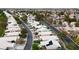 Panoramic aerial view of a residential neighborhood featuring tree-lined streets and well-manicured lawns at 4924 Cedar Lawn Way, Las Vegas, NV 89130