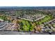 Expansive aerial view of the community showcasing lush greenery, golf course, and residential layout at 4924 Cedar Lawn Way, Las Vegas, NV 89130
