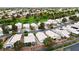 Charming single-story homes with well-kept yards, near a lush golf course, create a serene neighborhood setting at 4924 Cedar Lawn Way, Las Vegas, NV 89130