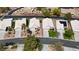 Aerial view of well-maintained homes with desert landscaping and private driveways in a quiet residential neighborhood at 4924 Cedar Lawn Way, Las Vegas, NV 89130