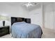 Well lit bedroom featuring a large bed, matching dressers and built in storage at 4924 Cedar Lawn Way, Las Vegas, NV 89130