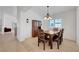Cozy dining room featuring a wooden table, stylish chairs, and natural light at 4924 Cedar Lawn Way, Las Vegas, NV 89130