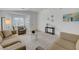 Spacious living room with natural lighting, comfortable seating, and neutral accents at 4924 Cedar Lawn Way, Las Vegas, NV 89130