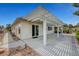 Spacious covered patio offering ample space for outdoor seating and entertaining with desert landscaping at 4924 Cedar Lawn Way, Las Vegas, NV 89130
