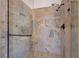 A closer view of the beautifully tiled shower with two showerheads and corner seat at 4924 Cedar Lawn Way, Las Vegas, NV 89130