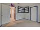 Bedroom with built-in shelving offers dual access, and lots of sunlight at 5124 Appealing Ct, Las Vegas, NV 89130