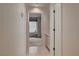 Bright hallway featuring tile flooring that leads into a carpeted room at 5124 Appealing Ct, Las Vegas, NV 89130