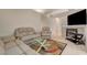 Spacious living room with fireplace, comfortable seating, and tile flooring at 5124 Appealing Ct, Las Vegas, NV 89130