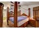This main bedroom offers a wooden four-poster bed with matching nightstands and elegant decor at 5124 Appealing Ct, Las Vegas, NV 89130