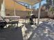 Relaxing covered patio with outdoor furniture and a built-in barbecue at 5255 Autumn Sky Rd, Las Vegas, NV 89118