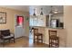 This kitchen features a granite breakfast bar and plenty of cabinets for storage at 5255 Autumn Sky Rd, Las Vegas, NV 89118
