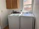 The laundry room features a full size washer and dryer at 5255 Autumn Sky Rd, Las Vegas, NV 89118