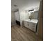 Bathroom featuring a vanity with black fixtures, mirror, and combination shower and tub at 555 E Silverado Ranch Blvd # 1034, Las Vegas, NV 89183
